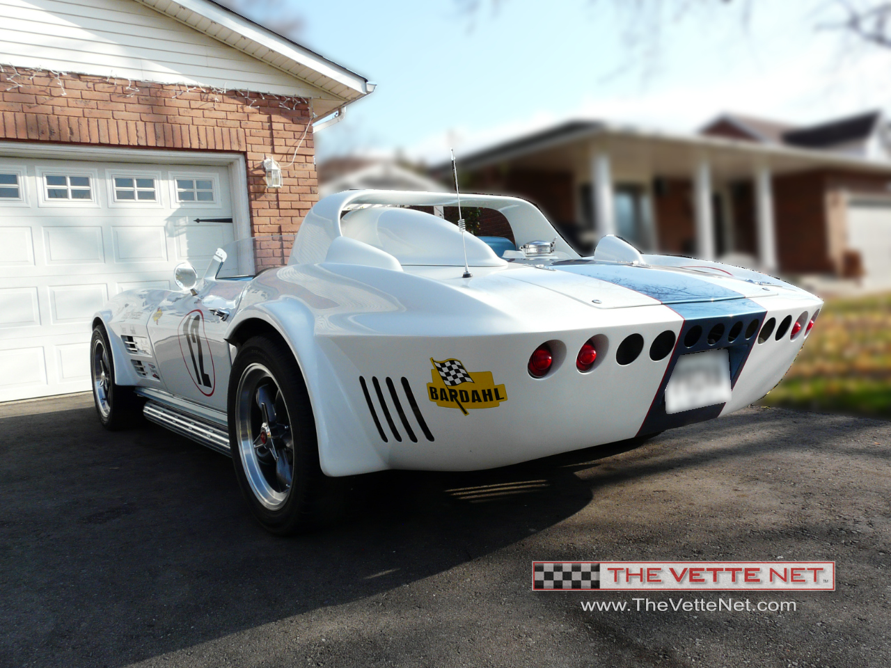 TheVetteNet.com - 1964 Corvette Convertible White with Blue Stripe